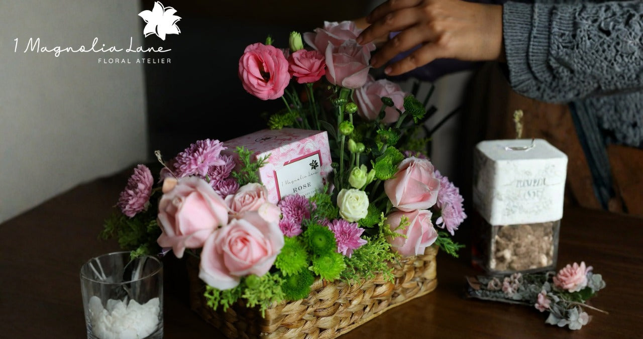 Luxury pink rose bouquet in a woven basket for Mother's Day gifting